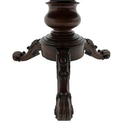 Victorian mahogany breakfast or centre table, circular moulded tilt-top, on turned pedestal and stepped moulded circular platform, three cartouche carved splayed supports carved with scrolled terminals, on castors 