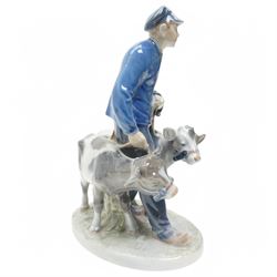 Three Royal Copenhagen figures, including Boy leading two Calves no. 1858, Boy with Calf no. 772, and Girl feeding Calf no. 779