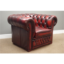  Chesterfield club armchair upholstered in deeply buttoned ox blood leather, W105cm, D88cm  