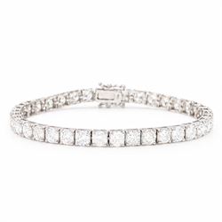 18ct white gold diamond bracelet, set with thirty-eight round brilliant cut diamonds, stam...