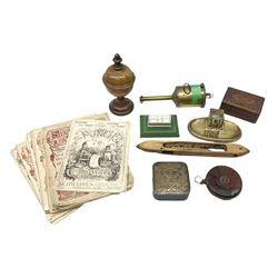 Olive wood lidded urn/vase, brass inkwell, Art Deco style perpetual desk calendar, leather bound Chesterman tape measure, brass roasting spit, Punch Magazines etc