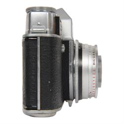 Kodak Retina Reflex camera outfit, comprising camera body serial no. EK 83509, six Schneider-Kreuznach lenses including Retina-Xenon f:2.0/50mm, Retina-Tele-Xenar f:4/135mm, Retina-Curtagon f:4/28mm and Retina-Longar-Xenon f:4/80mm, Retina-Curtar-Xenon f:4/35mm, Retina-Curtar-Xenon f:5.6/35mm, filters, platform and hood, contained within a tan Rowi carry case