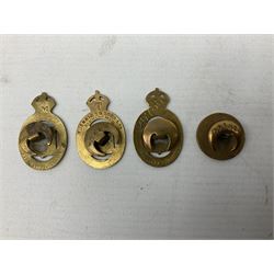 Military metal lapel and pin back badges to include stamped silver Old Coldstreamers Association example and another stamped silver badge, Royal Warwickshire examples, Glamorgan Yeomanry etc