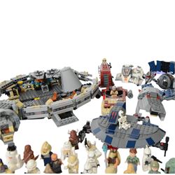 Collection of partially built Lego Star Wars models, including Motorized Walking AT-AT no. 10178, Hyena Droid Bomber no.8016, Emperor Palpatines Shuttle no. 8096, Jabbas Palace no. 4480 and Millennium Falcon no. 4504, etc together with a quantity of Lego Star Wars minifigures, loose parts and instruction booklets for Lego Star Wars sets