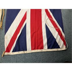 Six flags - White Ensign 180 x 86cm; two Union flags 180 x 86cm and 132 x 62cm; Falklands Islands 153 x 89cm; Yorkshire Rose 153 x 89cm; and QEII 1953 Coronation 84 x 57cm (6)