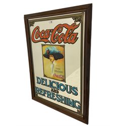 Late 20th century 'Coca Cola' style mirror (64cm x 89cm), and a 20th century frameless mirror (44cm x 67cm)