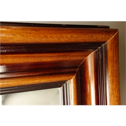  Bevelled edge wall mirror in moulded cherry wood frame, 76cm x 106cm  