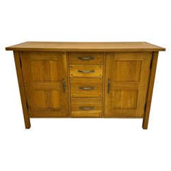Laura Ashley - 'Milton' light oak sideboard, fitted with four central drawers flanked by two panelled cupboards, on square supports