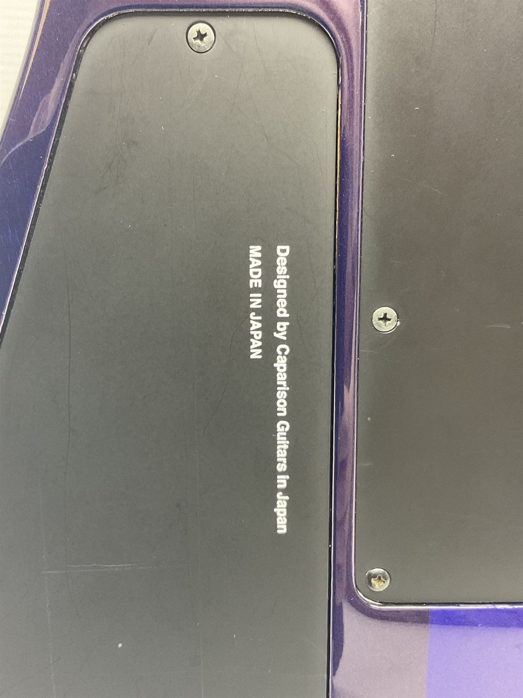 2015 Japanese Caparison Dellinger Prominence hand made boutique rock guitar in spectrum blue with clock inlays and Scaller tremolo; serial no.3200018; L100cm; in fitted case with certificate, registration card, tools etc