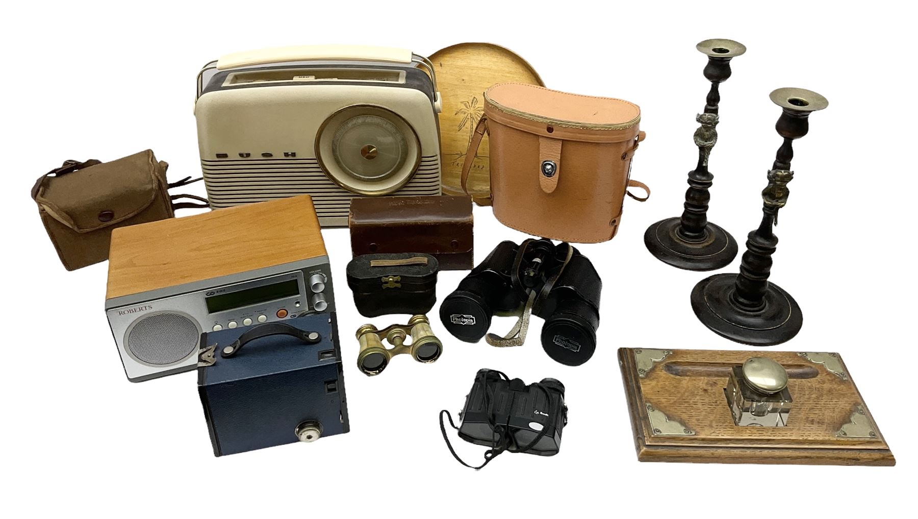 Pair of Rayswi of Harrogate carved oak candlesticks with brass mounts, in the form of an imp, together with a cased pair of Photopia binoculars, mother of pearl opera glasses, Bush radio, oak inkstand etc