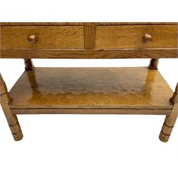 Mouseman - circa. 1950s oak serving table, adzed rectangular top over two drawers, on octagonal supports joined by adzed undertier, the rear right leg carved with mouse signature, by Robert Thompson of Kilburn