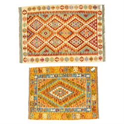 Two Chobi Kilim flatweave rugs, comprising the largest kilim on a cream ground with a grid...