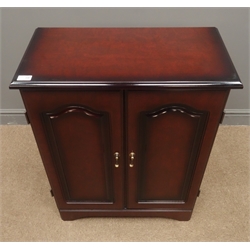  Mahogany cabinet, two shaker style doors enclosing fitted interior, shaped plinth base, W66cm, H83cm, D34cm  