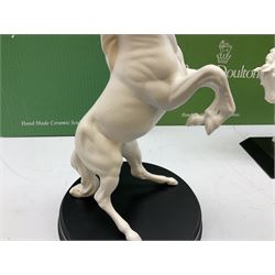 Five Beswick and Royal Doulton horse figures in matt white on black plinths, comprising of  Spirit of Affection no. 2689/2536, Springtime no.2837, Spirit of peace no.2916, Spirit of earth no.2914 and Spirit of the wild no. 183, together with a composite figure of a horse (6)
