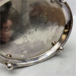 Late Victorian silver-plated biscuit barrel by William Hutton & Sons, on integral stand with four bun feet and ornate foliate engraved decoration, H20cm