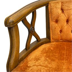Regency style wide seat tub-shaped armchair, beech framed upholstered in orange, buttoned back, on square tapering front supports