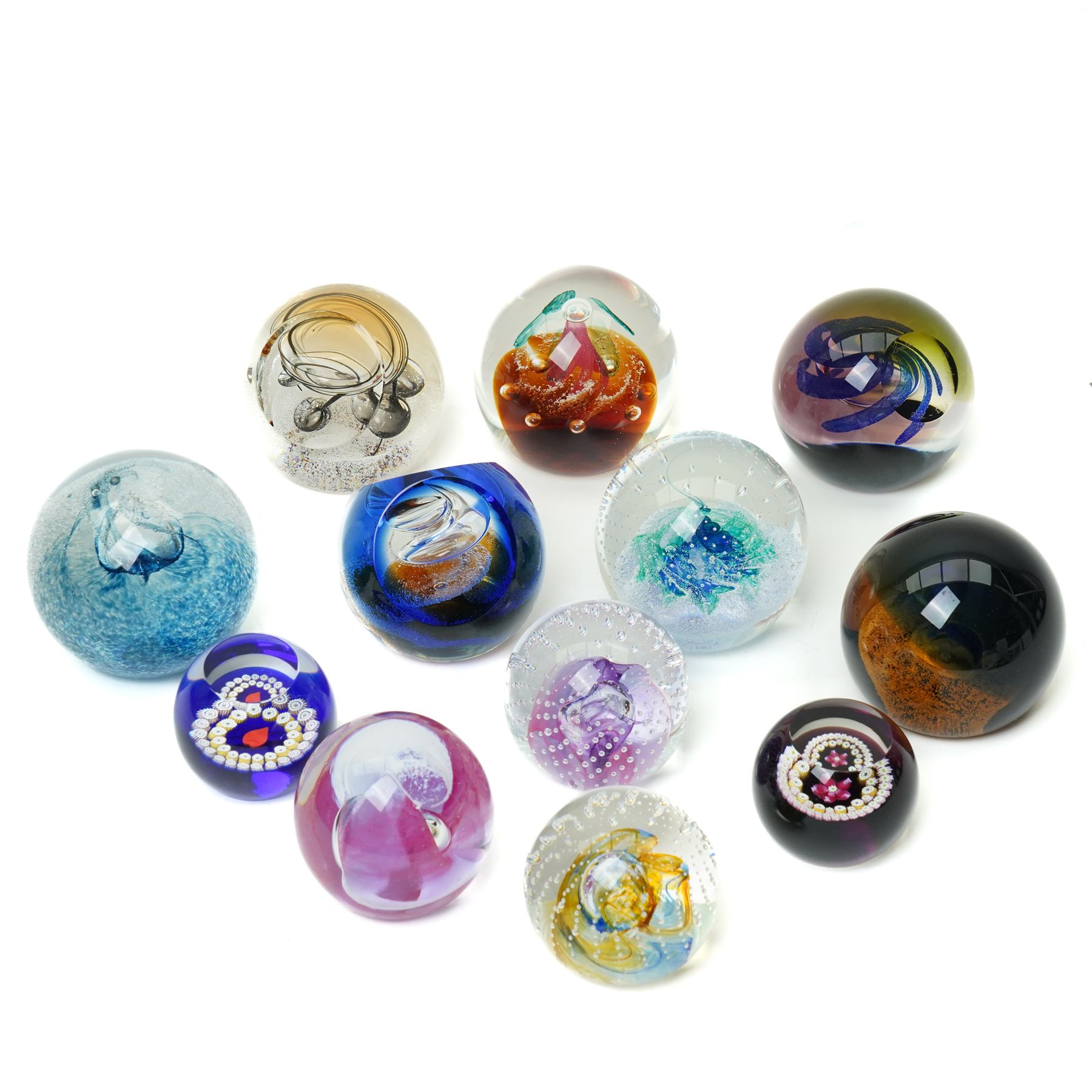 Seven Caithness large glass paperweights including Utopia 143/650, Messenger 40/750, Intrigue 513/750, Fascination etc and five smaller including Trapeze, Reflections etc all boxed