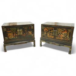 Pair of early 20th century Chinese ebonised and lacquered wood cabinets, the top decorated...