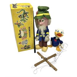 Two Pelham Puppets - The Magic Roundabout Mr. Rusty pole puppet with wool hands and blue  coat dated 1963; boxed; and Type SL Disney Donald Duck; unboxed (2)