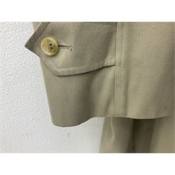 Ladies Burberry double breasted trench coat, with belt and detachable woollen gilet, in traditional cream colour with Burberry check lining, together with a gentlemans Burberry single breasted trench coat, both L112cm