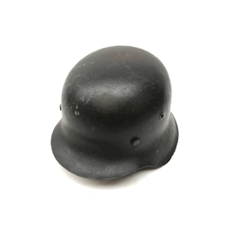  WW2 Waffen SS steel helmet, grey paint finish with single SS decal to side, interior stamped 2066 ?E?? with leather liner and chinstrap,   