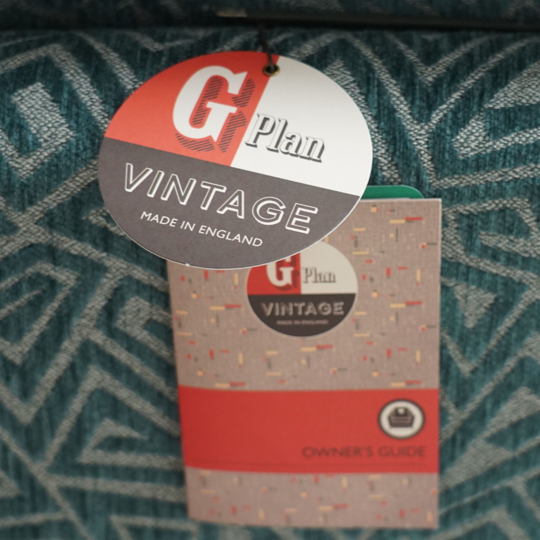 G-Plan Vintage - Contemporary unused Agatha 3 seater sofa, upholstered in G insignia fabric cushion seat and back cushion, rectangular side frame and matching fabric footstool, and additional unused seat cushion