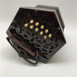Victorian concertina bearing label 'Maker - J. Powell 16 Ellis Terrace Holderness Road Hull', with hexagonal pierced rosewood ends W18cm