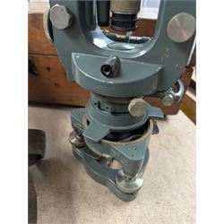 Two theodolites, comprising a Watts example in fitted hard case and a Cooke Troughton and Simms examplie in a wooden case, together with a Stanley dumpy level and a Hall and Watts surveyors measure