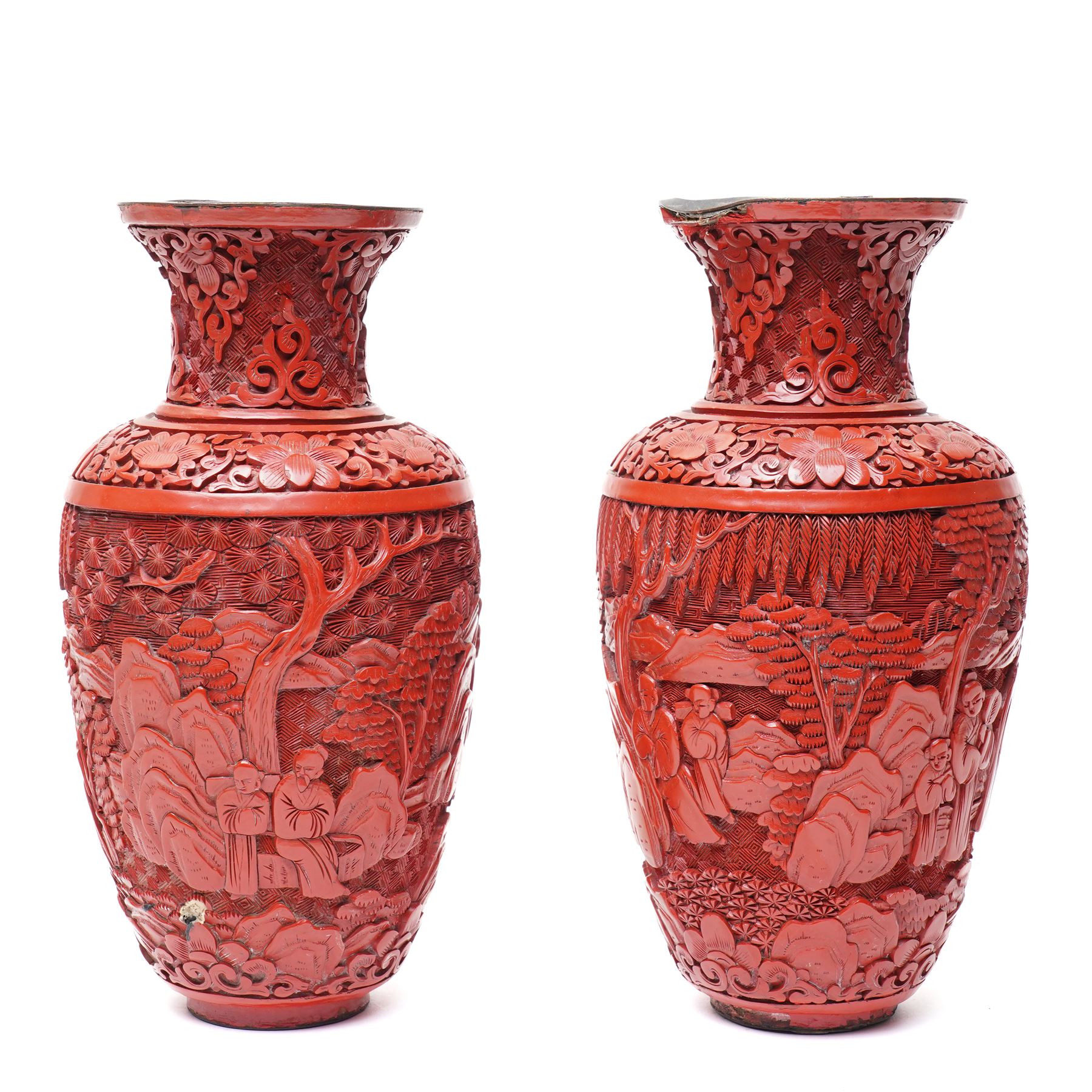 Pair of Chinese late Qing dynasty cinnabar lacquer vases, carved with scenes of figures in a landscape, H25cm (2)