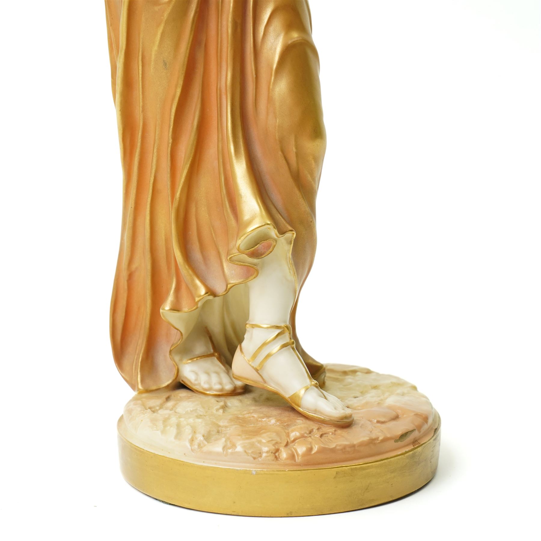 Pair of Royal Worcester figures of female musicians modelled by James Hadley, one with cymbals, decorated in gilt and on circular bases H33cm  