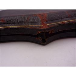 Set of ten Victorian silver coffee spoons, each with shaped scroll design rim, and a matching pair of sugar tongs, hallmarked Lee & Wigfull, Sheffield 1897, in tooled leather burgundy velvet and silk lined fitted case 