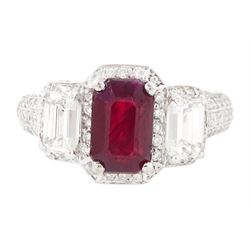 18ct white gold ruby and diamond trilogy ring, single emerald cut ruby of approx 1.85 cara...