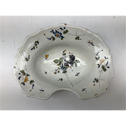 19th century French faience barber's blood-letting bowl, with painted floral decoration in polychrome upon plain ground, with painted initials CT mark beneath, L31cm