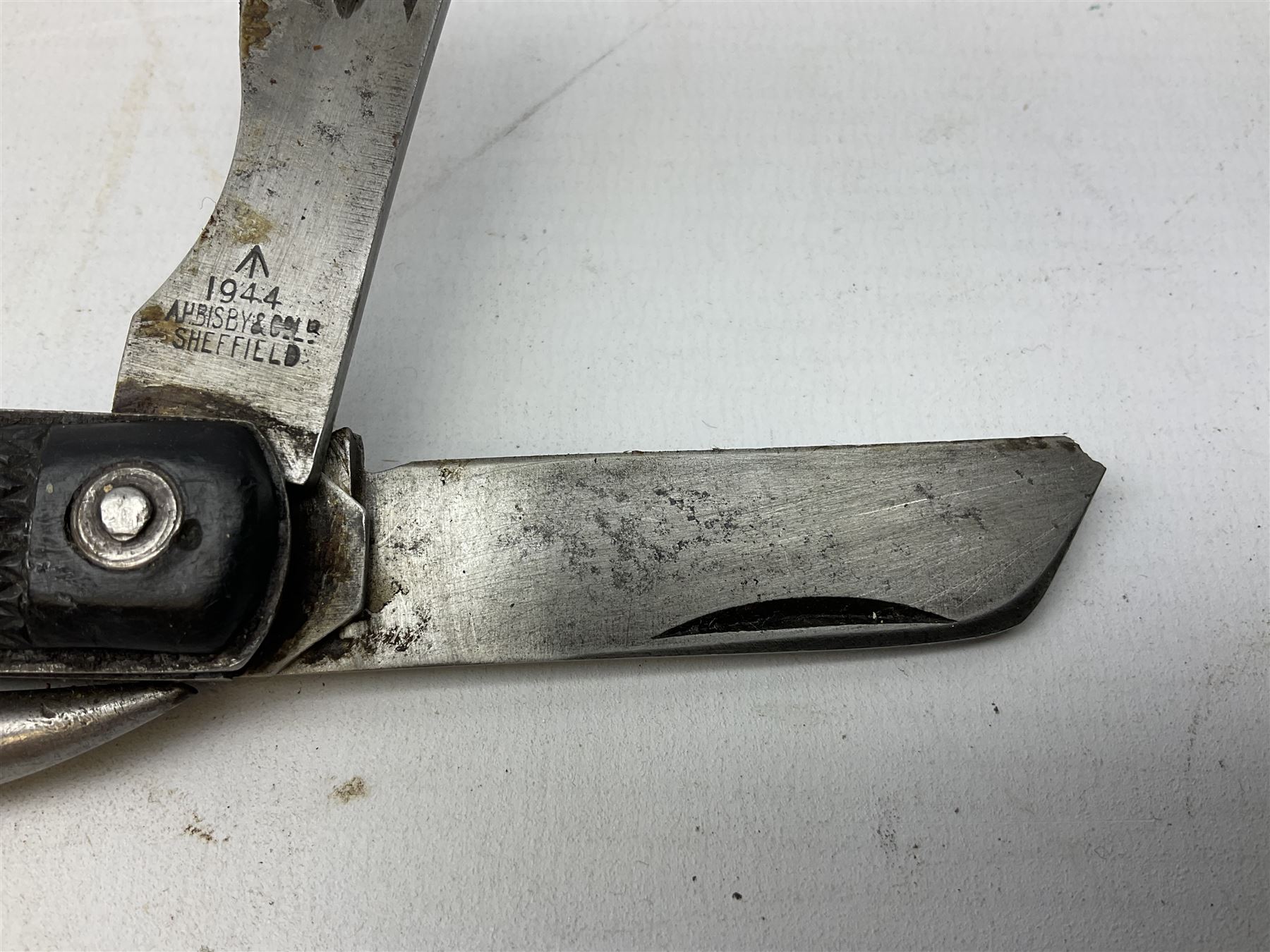WW2 British army folding jack/clasp knife, the blade marked A.H. Bisby & Co Ltd Sheffield with broad arrow and date 1944, marlin spike and can opener; and British Navy seaman's rope pocket knife, the blade marked Venture H.M. Slater Sheffield (2)