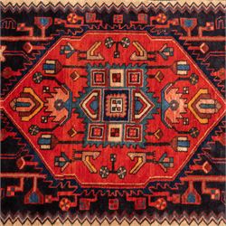 North West Persian runner, the indigo field centred by a red elongated hexagonal medallion with pendant motifs, surrounded by angular flowering stems, ivory stepped floral spandrels, enclosed by an indigo palmette border and red floral guard bands
