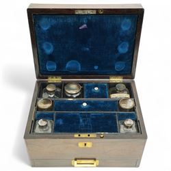 Victorian rosewood vanity box, the fitted interior containing various bottles and jars, the pin lifting to reveal lower drawer, H17cm x W28cm x D20cm
