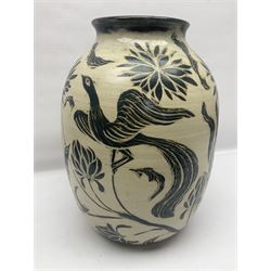 John Egerton (c1945-): studio pottery stoneware vase decorated with birds in flowers braches upon a white ground, H40cm