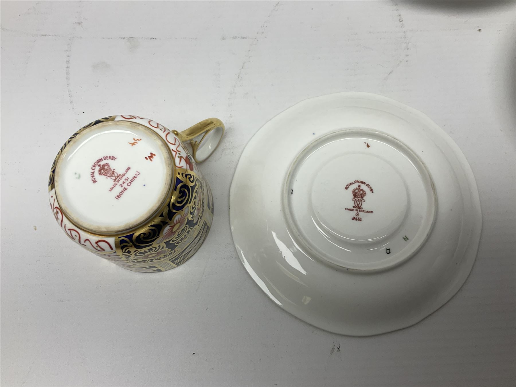 Six Royal Crown Derby cups and saucers all in imari pattern 2451, in various shapes  