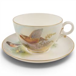 Royal Worcester large novelty cup and saucer, each hand pained, the cup with grouse, the saucer with stonechat
