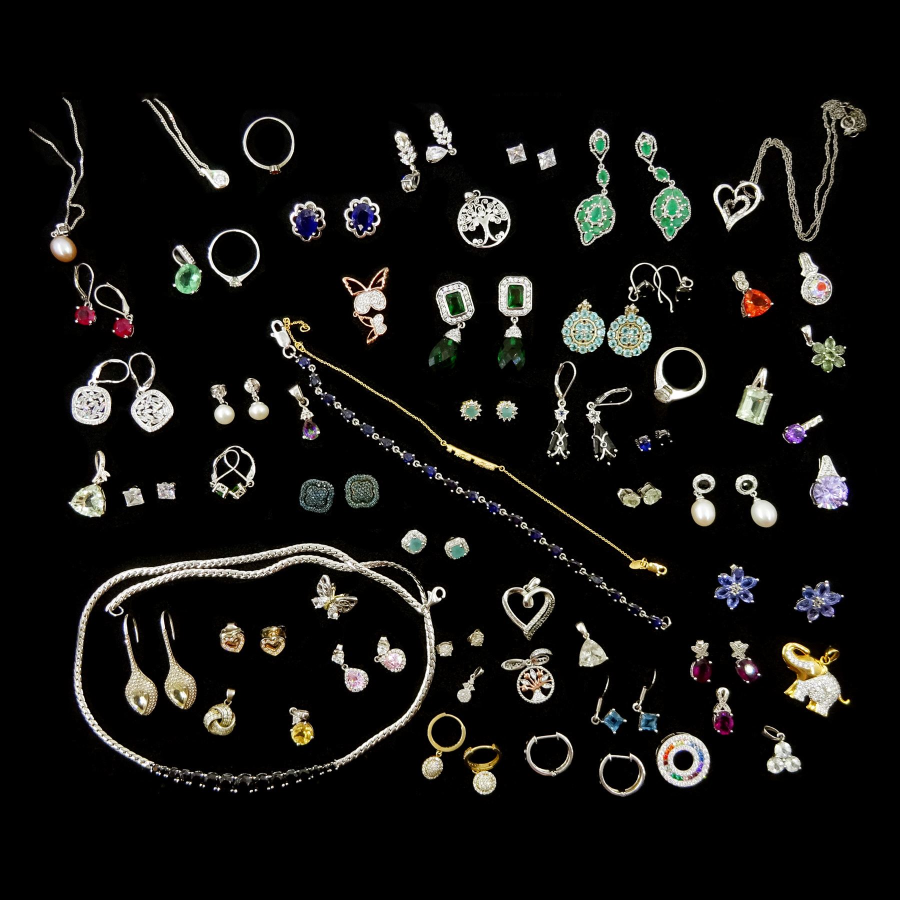 Stone set silver earrings, bracelets, rings, pendants and necklaces including diamond, pearl, quartz, topaz, cubic zirconia and garnet