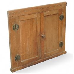 Mouseman - oak cupboard fascia or hatch, of rectangular form with twin panelled doors, circular hinges, raised on plinth, with carved mouse signature, by the workshop of Robert Thompson, Kilburn