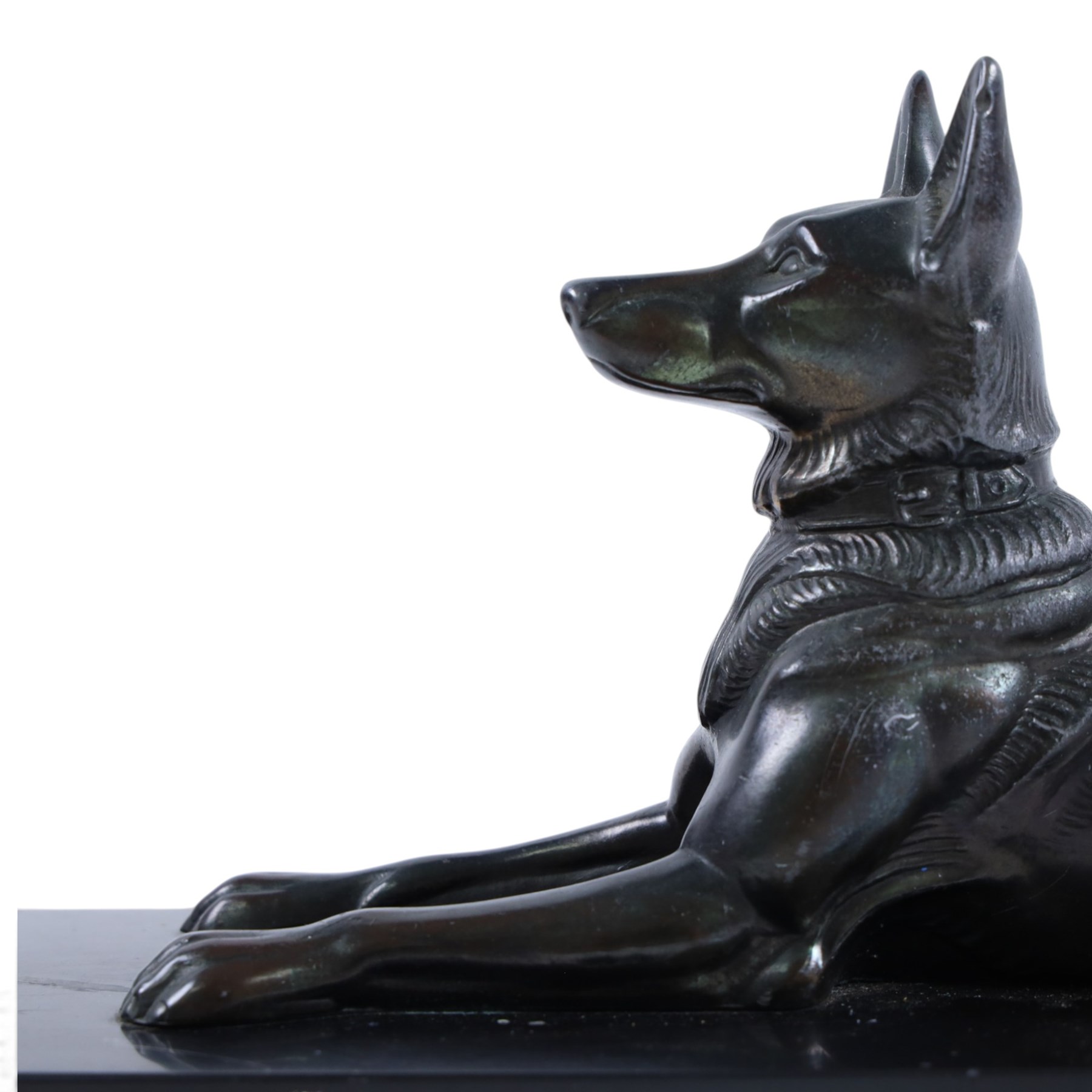 French Art Deco spelter figure of a recumbent dog on marble and onyx plinth, H14cm, L30cm