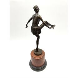 An Art Deco style bronze after D Alonzo, modelled as a dancer, with impressed mark and foundry mark, raised upon a cylindrical marble base, overall H47.5cm. 