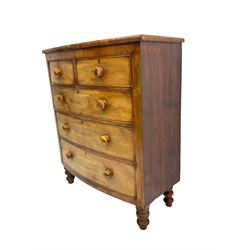 Late 19th century mahogany bow-front chest, fitted with two short and thee long graduating cockbeaded drawers, raised on turned supports