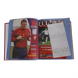 Comprehensive collection of approximately two hundred and twenty Scarborough FC football programmes for the 1999/00, 2000/01, 2001/02 and 2002/03 seasons, all filed within eight dedicated Scarborough FC red Home and Away binders