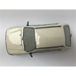 Lladro figure, Ford Fiesta, modelled as a Ford in beige, special commission by the Ford factory in Valencia, original box, no 7608, year issued 1989, year retired 1989, H9cm 