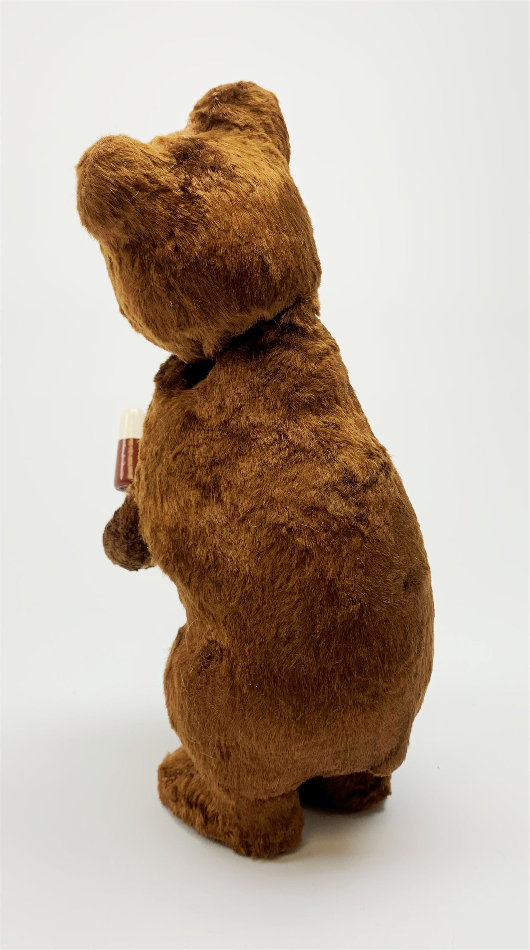 'Meabeab' Russian clockwork plush covered bear c1950s depicted standing with open mouth holding an ice lolly H9