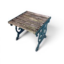 Small cast iron and wood slatted garden table