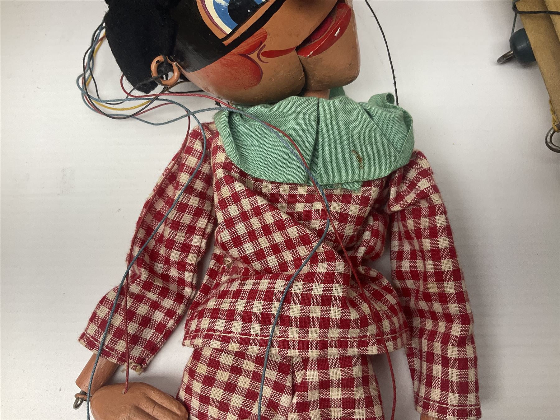 Pelham Puppet - a rare type SM Harlequin circa 1950s with painted black face mask, black felt hat, green ruff and red white chequered suit, H31cm; in original box with instructions 