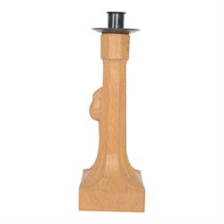 Mouseman - oak candlestick, with metal sconce, octagonal column, on a square base, carved with mouse signature, by the workshop of Robert Thompson, Kilburn, H31cm